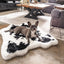 PupRug® Animal Print Memory Foam Dog Bed - Black Faux Cowhide Junior (40" L x 35" W) Dog Beds Paw.com