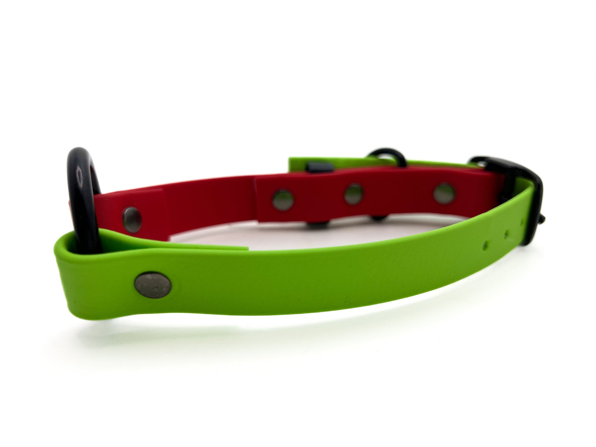 Image of a red and green biothane collar on a white background